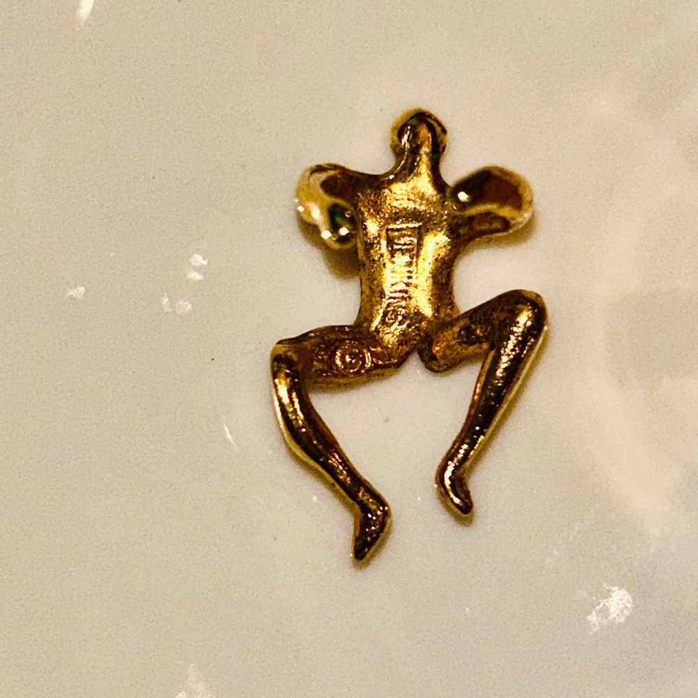Gold ‘Climbing man’ by Jenkins’s Jewelry stamped, vintage ear cuff.